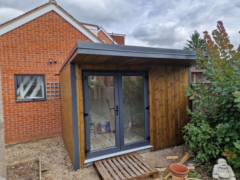 Front view on handover day, French doors and canopy