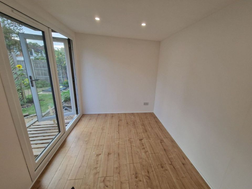 Inside: white walls, oak-effect floor, downlights